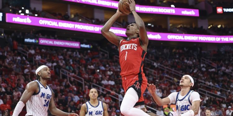 Rockets rally from down 11 in 4th to top Magic in OT