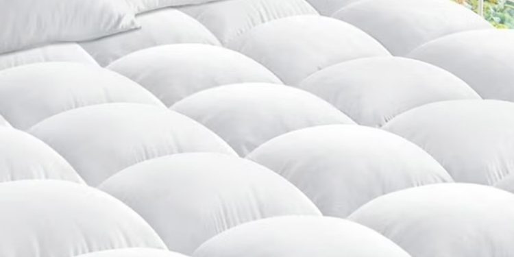 Walmart is selling a mattress topper for $35 that 'has revolutionized' how buyers sleep